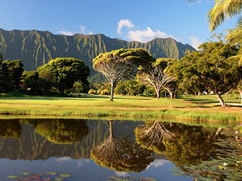 Olomana Golf Links golf course on Oahu featuring wide fairways, water hazards, and views of the Koʻolau Mountains